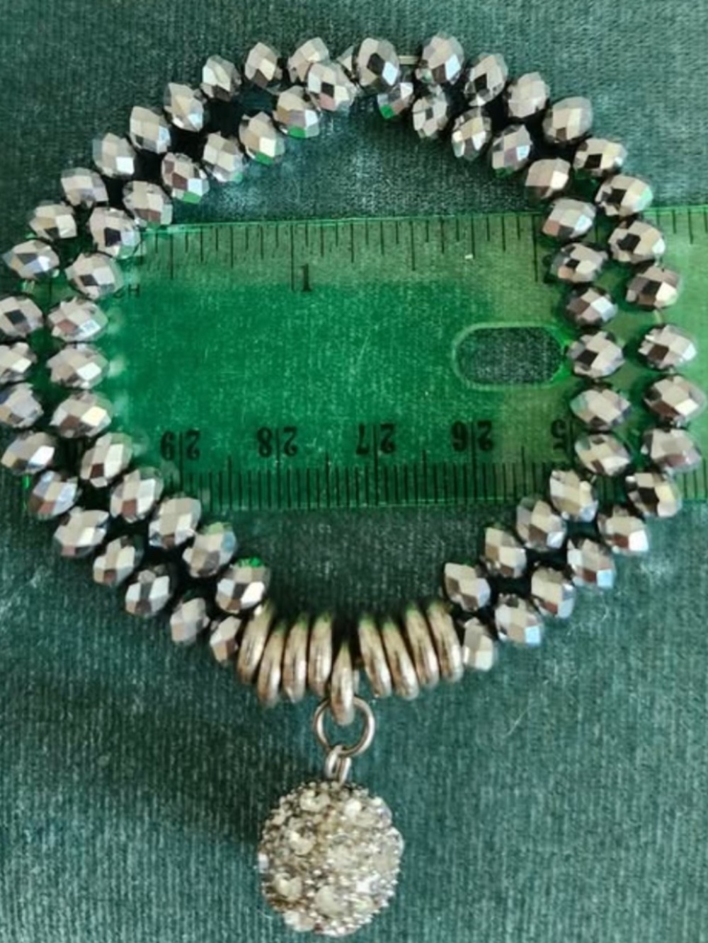 Women's bracelet with silver tone ball